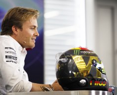 Rosberg edges Hamilton in first session
