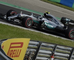 Rosberg takes pole in dramatic session
